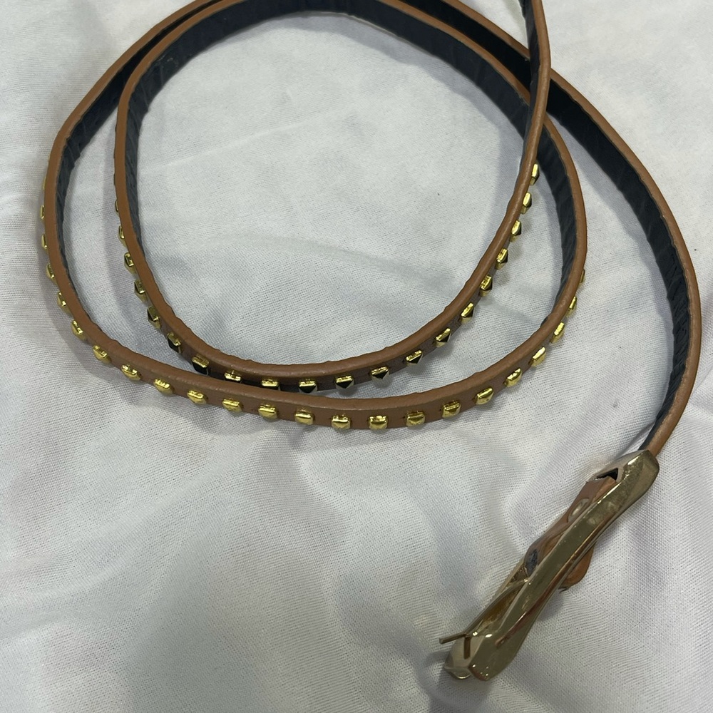 Light brown belt with gold studs